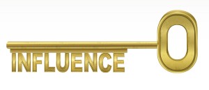 influence - golden key isolated on white background